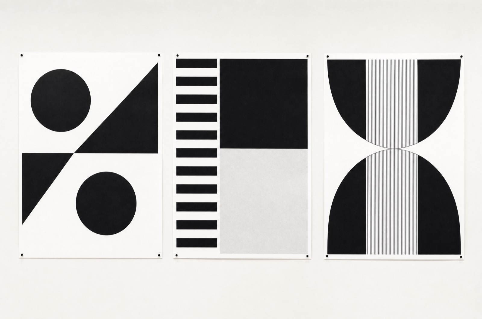 Three Halcyon posters, bold geometric compositions in black on white